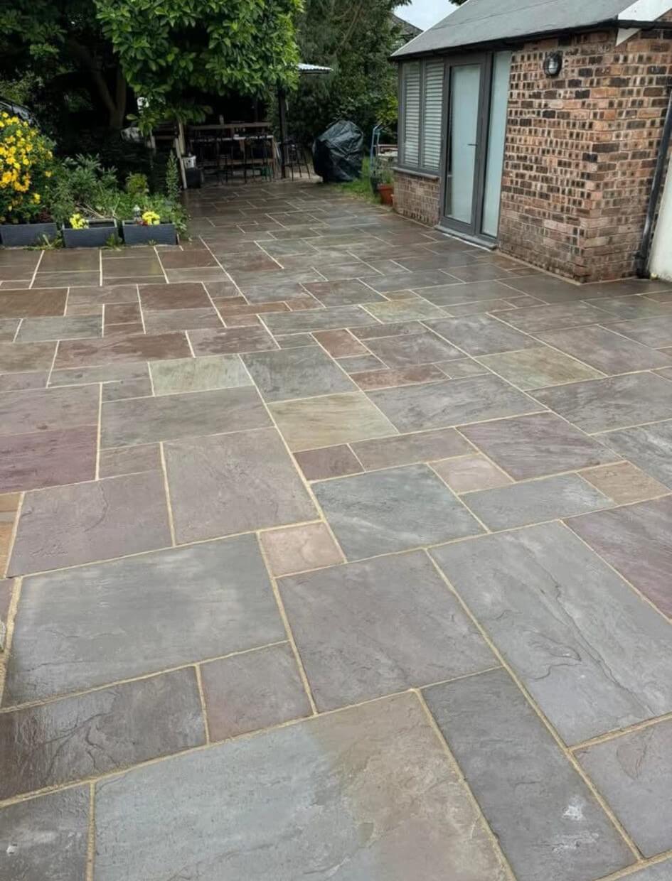 Natural stone patio with fresh mortar joints - repointing and restoration