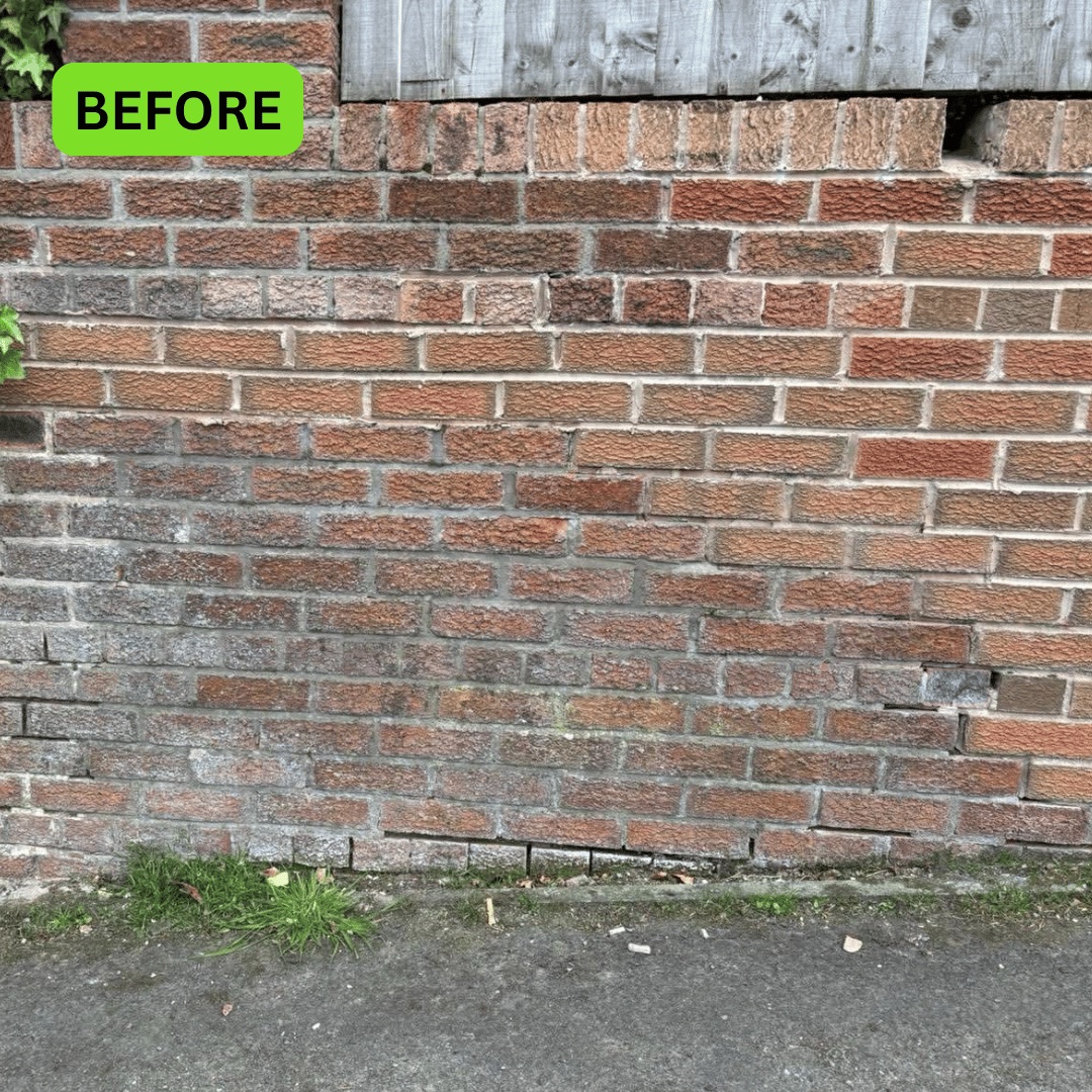 Garden wall in Leigh with eroded mortar joints before repair
