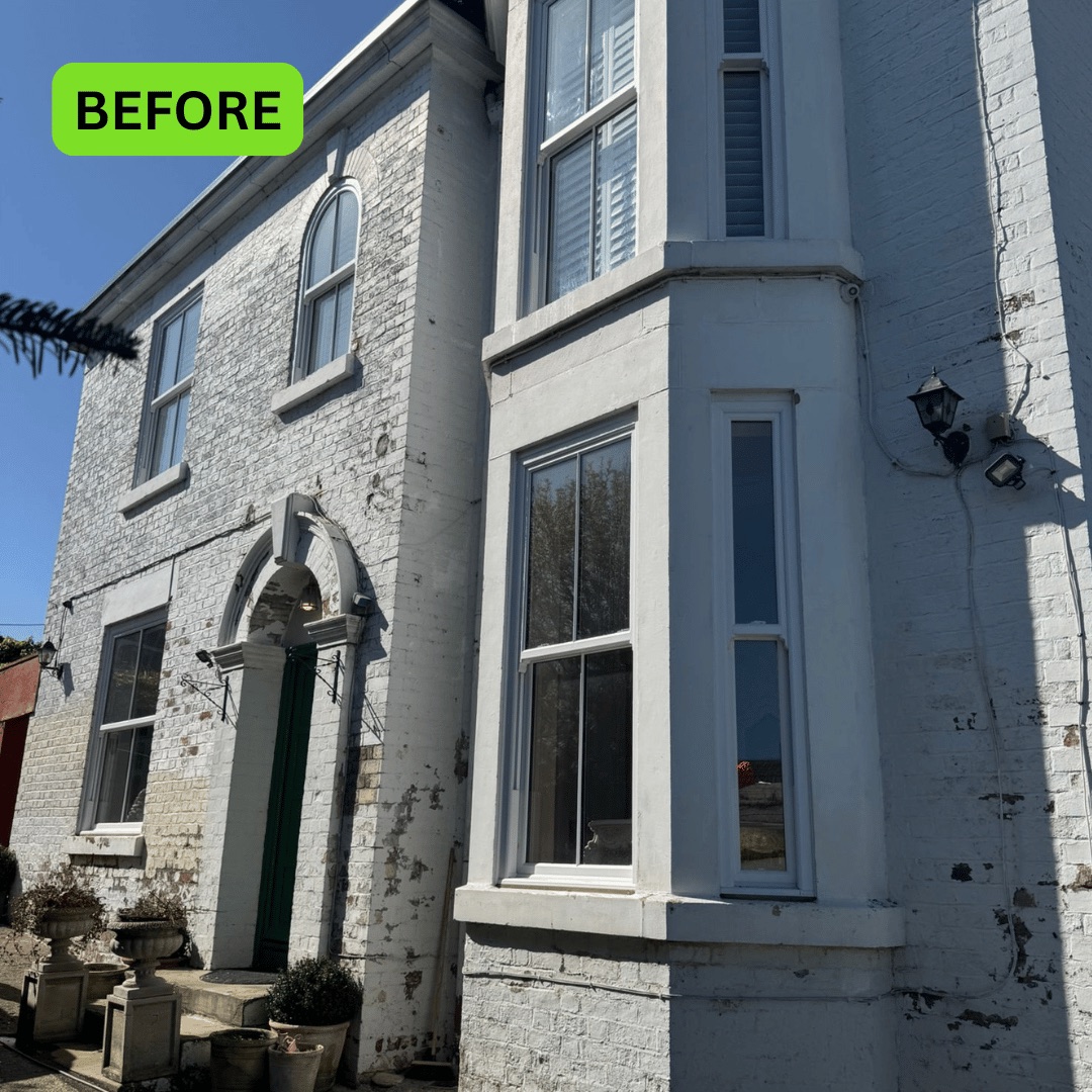 Painted brick period house before brick restoration in Manchester