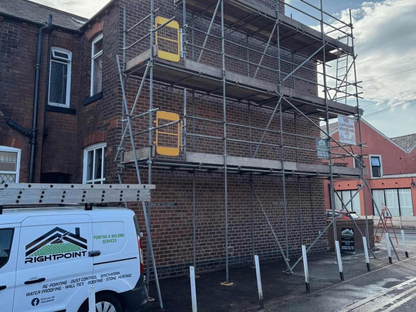 Right Point van and scaffolding outside a property being repointed in Wigan